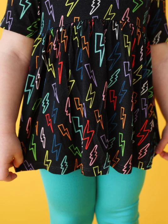 Posh Peanut Little Girl's & Girl's 2-Piece Lightning Bolt Peplum Top & Legging Set For Kids 7 Posh Peanut Little Girl's & Girl's 2-Piece Lightning Bolt Peplum Top & Legging Set For Kids - Image 5