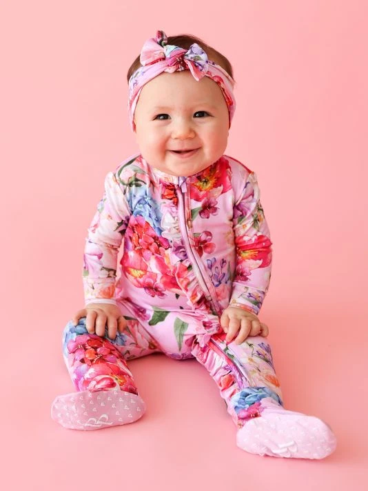 Posh Peanut Baby Girl's Brisa Ruffled Double Zip One-Piece Footie For Kids 6 Posh Peanut Baby Girl's Brisa Ruffled Double Zip One-Piece Footie For Kids - Image 4