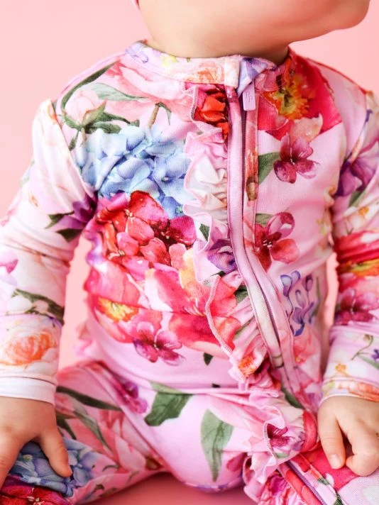 Posh Peanut Baby Girl's Brisa Ruffled Double Zip One-Piece Footie For Kids 7 Posh Peanut Baby Girl's Brisa Ruffled Double Zip One-Piece Footie For Kids - Image 5